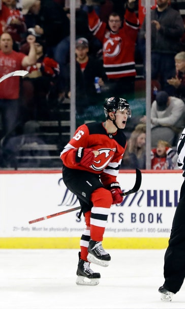 Hughes scores 1st NHL goal in Devils' 1-0 win over Canucks